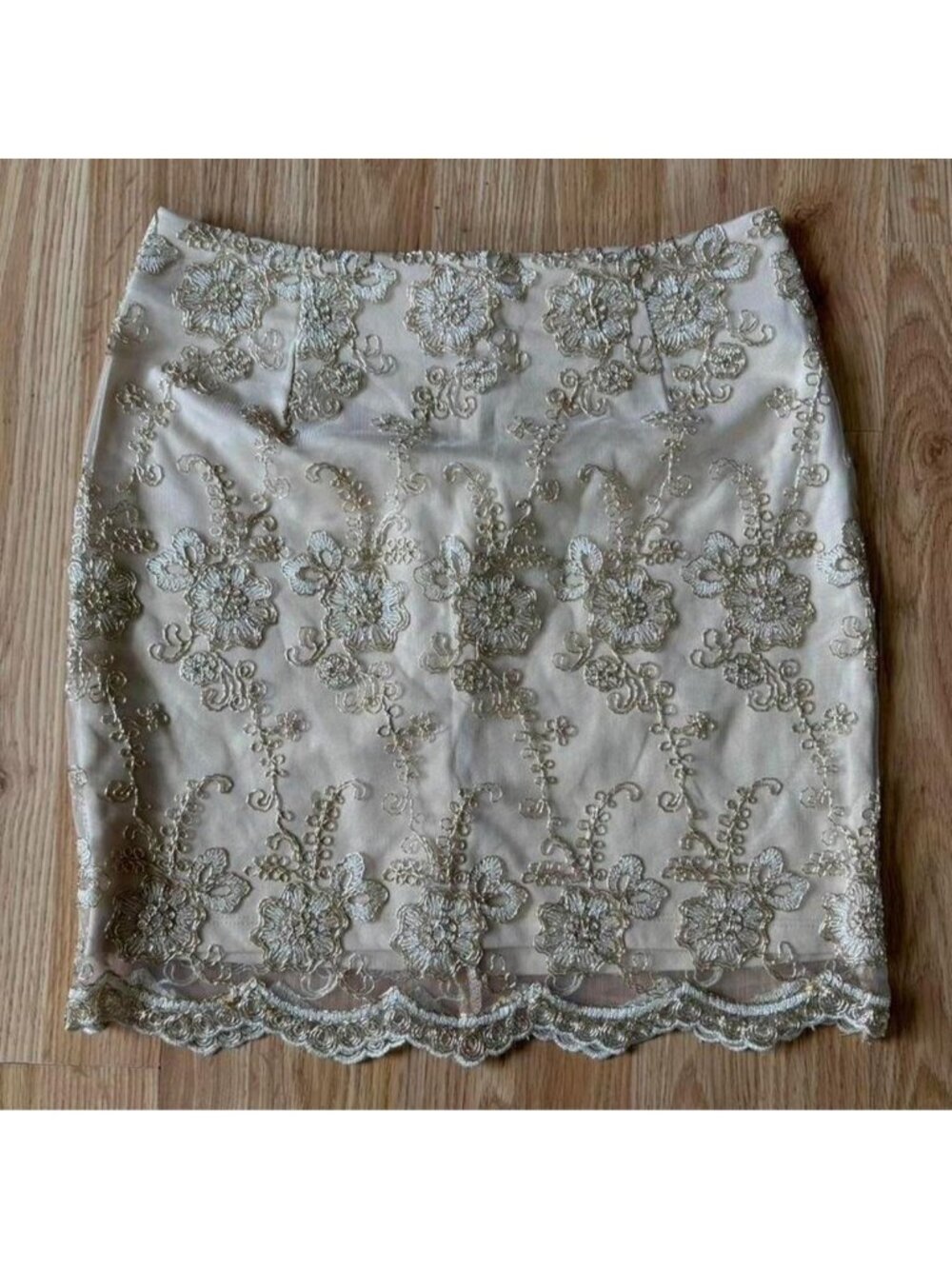 Shimmery gold lace and mesh layered mini skirt